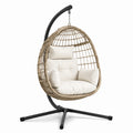 Sillón colgante de ratán sintético con cojines crema y estructura de acero, 105x105x195 cm